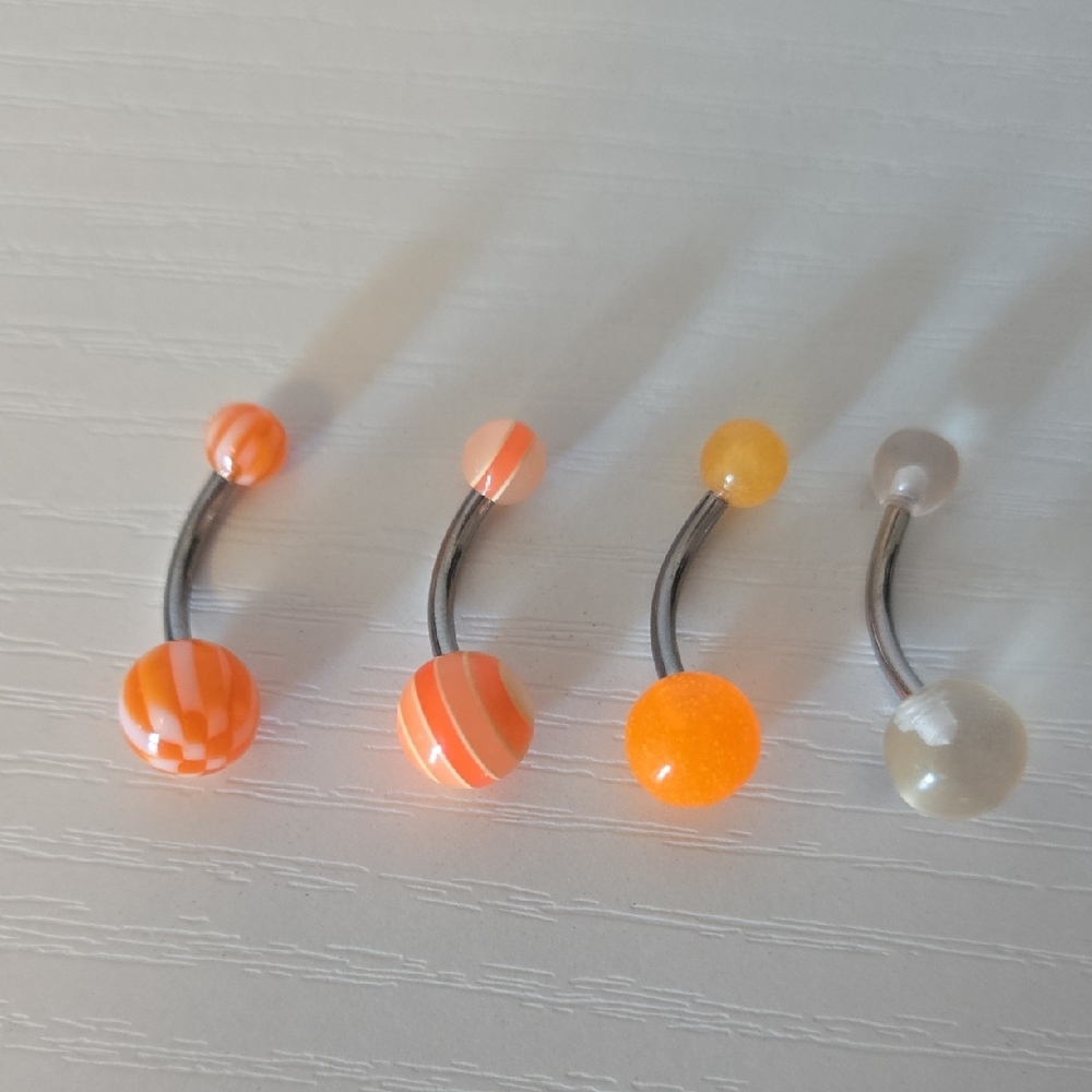 Set of Four Orange and White Belly Button Rings
